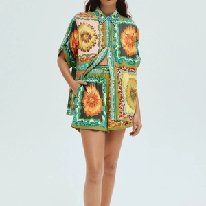 Retro green floral two-piece set featuring sunflower print shirt and drawstring shorts