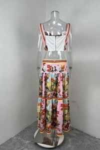Back view of floral printed crop top and high-waisted tiered maxi skirt set