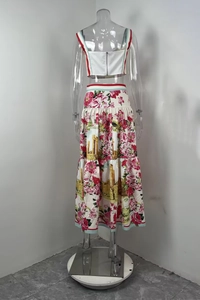Back view of summer floral print two-piece set with crop top and tiered maxi skirt