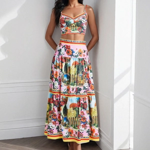 Women's 2-piece set featuring a floral crop top and high-waist tiered maxi skirt