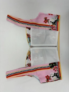 Detailed internal view of floral printed bandeau strap top with zipper closure and lining