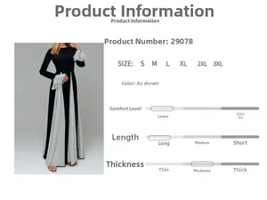 Detail of elegant black and white patchwork dress with ruffled cuffs and backless design