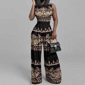 Close-up of sleeveless jumpsuit with vintage gold peacock pattern and high waist cut