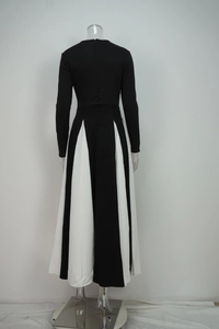 Detail of the back showing concealed zipper and black-white color block panel dress