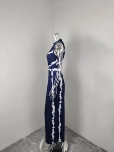 Detailed side view of navy blue and white tie-dye sleeveless slim fit maxi jumpsuit