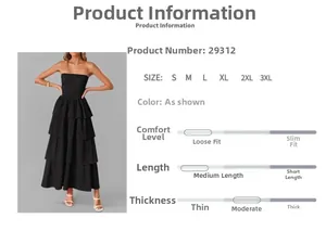 Detail view of black strapless tiered maxi dress showing smocked bodice and layered skirt
