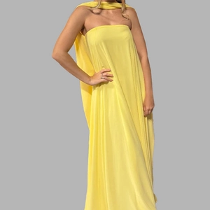 Elegant strapless yellow chiffon maxi dress with matching neck sash for formal occasions