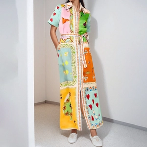 Detailed pattern view of colorful graffiti and poker print on a long sleeve dress