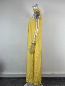 Side view detail of a yellow sleeveless maxi evening dress on a transparent mannequin