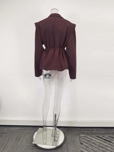Back view of a deep red long-sleeve blazer featuring padded shoulders and a belted waist design
