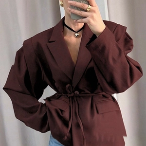 Burgundy oversized blazer featuring puff sleeves with pleated cuffs and a waist drawstring