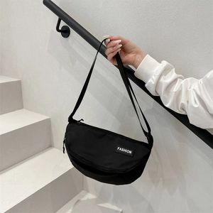 Versatile black nylon crescent crossbody bag with adjustable strap for daily commute