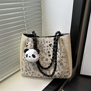 Sac cabas chic en paille tissée crème avec graffitis noirs et charmant pendentif panda