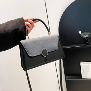 Modern two-tone leather handbag with grey woven texture and gold magnetic clasp for women