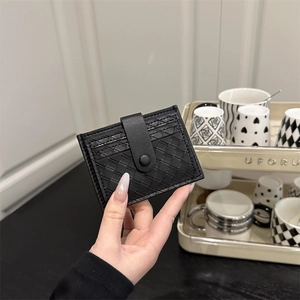 Slim black woven leather wallet for driver licenses with multiple card slots and snap button