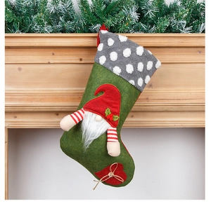Detail of Christmas stocking hanging on mantel with 3D gnome and plush polka dot trim