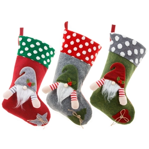 Three Christmas gnome stockings in red, green, and gray felt with hanging loops