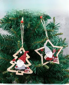 Detail of wooden Christmas pendants featuring Santa Claus in star and tree shapes