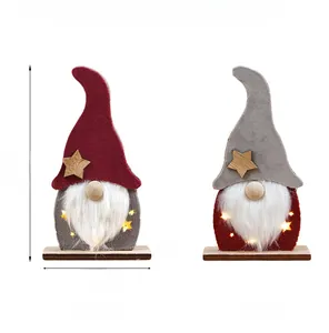 Detail view showing lighted 18cm Christmas gnome ornaments with star cutouts