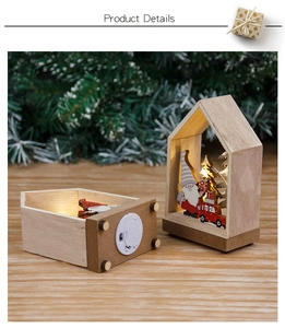 Detail of wooden Christmas house LED light showing the battery compartment and CE mark