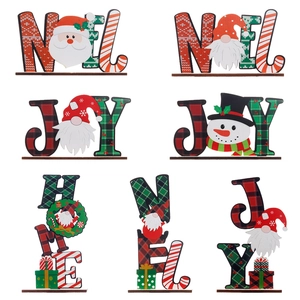 Christmas wooden letter ornaments with Santa and gnomes for festive tabletop decoration