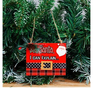 Hanging wooden Christmas sign with Dear Santa I Can Explain text on festive tree