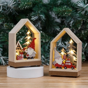 Lighted wooden Christmas house set with LED warm glow and festive miniature village scene