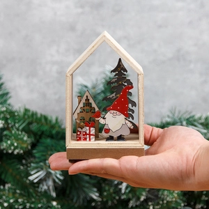 Lighted wooden Christmas gnome house ornament with warm LED lights for festive desk decor