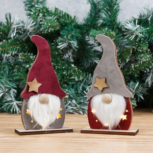 Two lighted Christmas gnomes decorations with LED beards on wooden base ornaments
