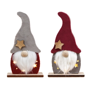 Lighted Christmas gnomes wooden ornaments with LED glowing star cutouts on white background
