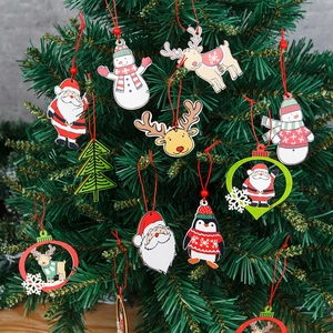 Set of 6 wooden Christmas ornaments featuring Santa and reindeer on a green tree branch