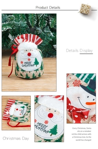 Close-up of burlap Christmas gift bags with Santa and Snowman applique embroidery detail