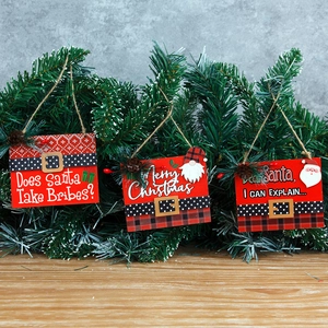 Three-piece set of wooden Christmas tree ornaments featuring festive gnomes and sayings