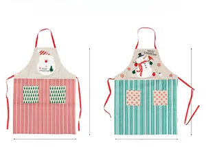 Detailed view of red and green Christmas aprons with festive Santa and Snowman embroidery