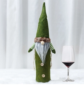Detail of green gnome wine bottle cover with long felt hat and grey beard for Christmas decor