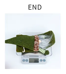 Detailed view of green Christmas gnome bottle cover weighing approximately 38.6 grams