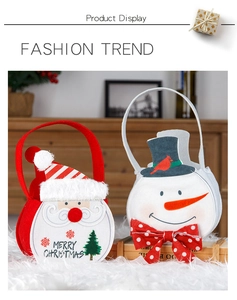 Detail of Christmas gift bags featuring Santa and Snowman with plush trim and embroidery