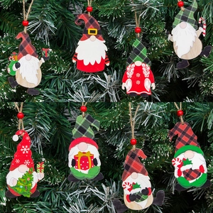 16-piece set of wooden Christmas gnome ornaments with red and green plaid patterns
