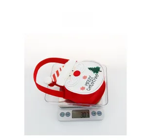 Detailed view of the Christmas felt gift bag weight at 30.7g on an electronic scale