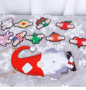 Detail of wooden gnome welcome sign with nine interchangeable seasonal holiday icons