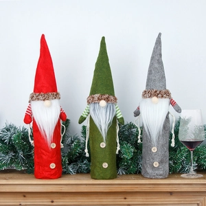 Three-piece Christmas gnome wine bottle covers in red green and grey for holiday table decor
