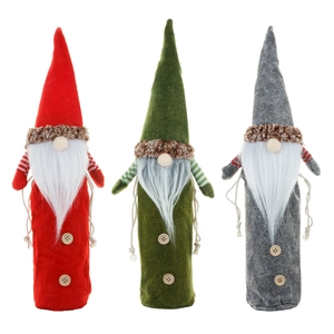 Three Christmas gnome wine bottle covers in red, green, and gray for holiday table decor