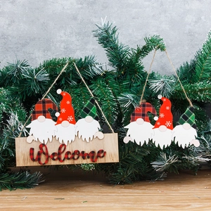 Christmas wooden gnomes welcome sign door hanger with red and green festive gnome designs