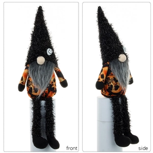 Detail of Halloween gnome featuring skull patterned body and long dangling legs
