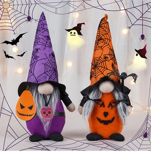 Detail of Halloween gnome plush dolls featuring skull, pumpkin, and spider web patterns