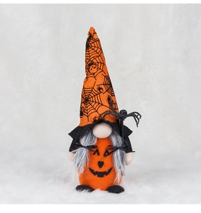 Detail of Halloween gnome plush with pumpkin body and spider web hat ornament