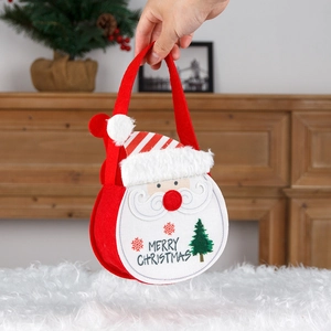 Red felt Christmas gift bag featuring a 3D Santa Claus and Merry Christmas print