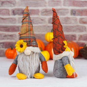 Harvest gnome plush set with sunflowers and pumpkins for Thanksgiving decor