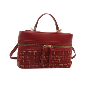 Red and gold tweed box handbag with crossbody strap and double zipper closure