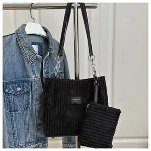 Detail of black corduroy tote bag and matching pouch with Jingpin leather label